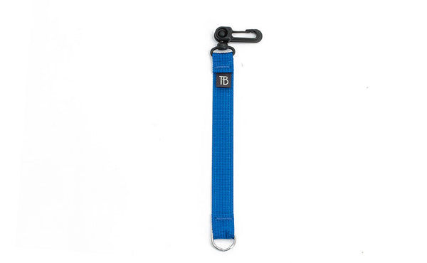 An 8-inch Island (blue) Key Strap with a snaphook at one end and a split-ring o-ring at the other.